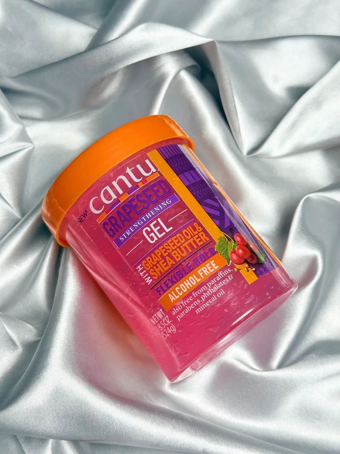 IMG_1734 کنتو ژل حالتدهنده و تقویتکننده مو حاوی روغن هسته انگور و شیباتر (Cantu Grapeseed Strengthening Styling Gel with Grapeseed Oil & Shea Butter. 524g)حجم524گرم - تصویر 1