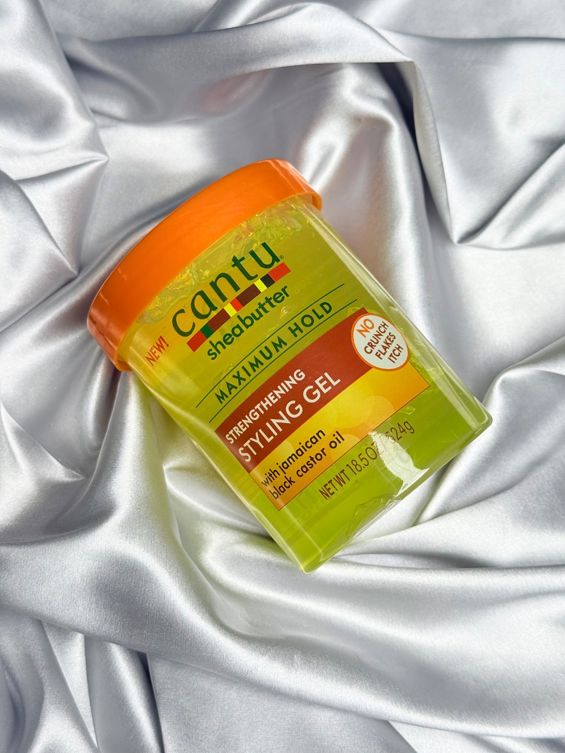 IMG_1737 کنتو ژل حالتدهنده و تقویتکننده موی فر حاوی روغن کرچک سیاه جامائیکا مدل(Cantu Shea Butter Strengthening Styling Gel with Jamaican Black Castor Oil – Maximum Hold)حجم524 میلی گرم - تصویر 1